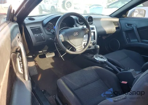 2007 Hyundai Tiburon Gs z USA, uszkodzony, nr VIN KMHHM66D57U258775